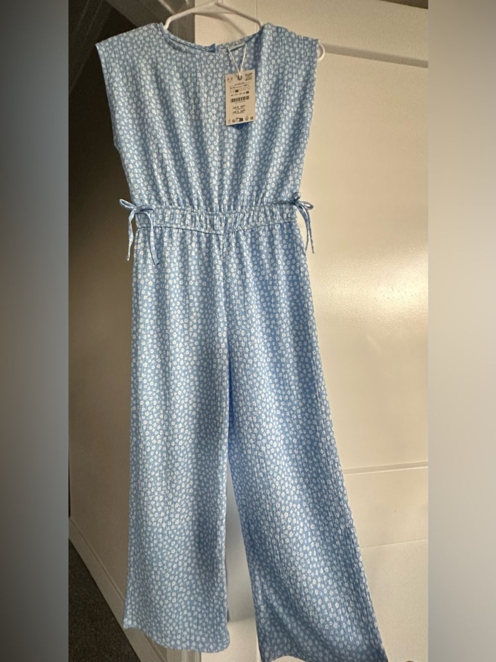 NEW ZARA Girls’ Light Blue Floral Jumpsuit – Size 9–10 (140 cm)